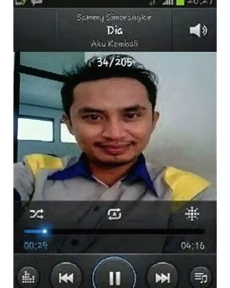 Amal Syarif wajah yang selalu muncul sebagai cover art default MP3