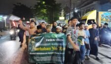 Antusias Pawai Obor Warga Rawa Bokor, Kecamatan Benda.