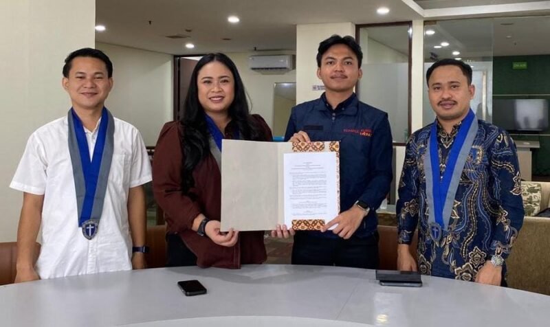 Penandatanganan MoU PP GMKI dan AIM Digital (Foto: Istimewa)