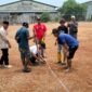 Pemerintah desa mekarjaya sepatan, melakukan pengukuran aset desa berupa tanah bengkok sekaligus pemasangan patok (Doc. Ist/PB)